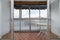 sunroom with white brick walls table for leisure