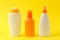 Sunscreen remedy. various sunscreens on a bright yellow background. Sun protection. Ultraviolet protection. Summer. Vacation