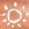 Sunscreen sun cream drawing on skin for suntan lotion sunblock concept closeup. Female body crop of illustration painted on body
