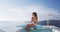 Sunscreen suntan bikini woman applying sunscreen spf lotion on body on vacation