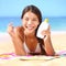 Sunscreen woman applying suntan lotion