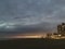 Sunset above Coney Island Boardwalk - View from Brighton Beach in Brooklyn, New York, NY.