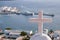 Sunset above Mykonos town. Ships on Aegean sea, Greece