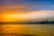 Sunset on Aegean sea with cruise ship silhouette