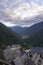 Sunset aerial view of the Catalan Pyrenean village of Canejan with Bosost in the background of the Aran Valley