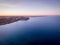 Sunset aerial view of the coastline of Portopalo, Sicily, Italy