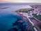 Sunset aerial view of the coastline of Portopalo, Sicily, Italy