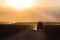 Sunset in african savannah, silhouettes of safari car, Africa, Kenya, Amboseli national park