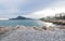 Sunset along the coastal promenade with stone beach of Altea with view on mountain, Altea, Costa Blanca, Spain