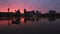 Sunset along Willamette River with Cityscape and Hawthorne Bridge in Portland Oregon