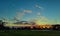 Sunset with Altocumulus Clouds Over Blue Sky