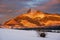 Sunset with the amazingly lit peak of the High Tatras Krivan