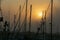 Sunset amidst the ship masts at the boatyard in Brookings, Oregon