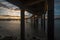 Sunset as seen from shore below jetty at Changi board walk. In the background is Changi Beach Club.