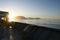 Sunset on the Atlantic ocean, view from the forward mooring station of the container vessel