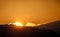 Sunset in the austrian alps with silhouette of colorful clouds and mountains in the austrian alps in styria