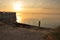 Sunset on the Azov Sea, girl on the shore