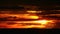 Sunset back on red orange cloud and silhouette cargo ship passing on sea