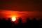 sunset back on silhouette coconuts tree in evening sky