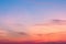 Sunset background. sky with soft and blur pastel colored clouds. sunshine through the gradient cloud on the beach resort. nature