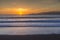 Sunset from Baker Beach overlooking Pacific Ocean at dusk, South Bay, San Francisco