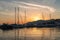 Sunset in Baska Voda town with Adriatic Sea and boats, Croatia