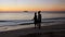 Sunset at the beach in Barbados Island, Caribbean. Cruise ship captured at sunset, sailing away from Barbados Harbor