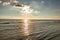 Sunset on the beach of BlÃ¥vand in Denmark. Walking in the evening in great light atmosphere