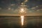 Sunset on the beach of BlÃ¥vand in Denmark. Walking in the evening in great light atmosphere