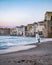 Sunset at the beach of Cefalu Sicily, old town of Cefalu Sicilia panoramic view at the colorful village