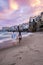 Sunset at the beach of Cefalu Sicily, old town of Cefalu Sicilia panoramic view at the colorful village