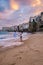 Sunset at the beach of Cefalu Sicily, old town of Cefalu Sicilia panoramic view at the colorful village