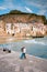 Sunset at the beach of Cefalu Sicily, old town of Cefalu Sicilia panoramic view at the colorful village