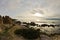 Sunset on a beach at Nora archeological site, near city of Pula, island of Sardinia