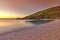 The sunset at the beach Panormos of Skopelos, Greece