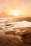 Sunset Beach Photo Composite in Malibu, California with Waves splashing onto the Sand and a Lone Person in the Distance