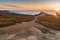 Sunset in beach with rocks in Porto Covo in Alentejo, Portugal