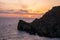 Sunset on a beautiful spring day with calm sea, seen from Anchor Bay, Mellieha, Malta.