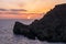 Sunset on a beautiful spring day with calm sea, seen from Anchor Bay, Mellieha, Malta.