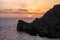 Sunset on a beautiful spring day with calm sea, seen from Anchor Bay, Mellieha, Malta.