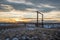 Sunset Behind Country Wooden Gated Driveway Entrance in Farm and Ranch Land of Colorado