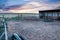 Sunset behind fencing and barn in Eastern Plains Colorado