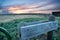 Sunset behind fencing and barn in Eastern Plains Colorado