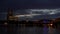 Sunset behind illuminated Cologne Cathedral and The Hohenzollern Bridge over the River Rhine, Germany