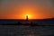 Sunset behind Mangiabarche`s Lighthouse in Calasetta Sea 03