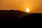 Sunset behind the sand dunes