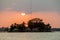 Sunset behind Santa Barbara islet in Peten Itza lake near Flores city, Guatema