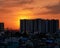 Sunset behind tower block in Vietnam