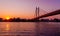 Sunset on Belgrade river named Sava with huge bridge across the river.