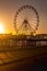 Sunset by the big wheel on Central Pier, Blackpool, Lancashire, UK